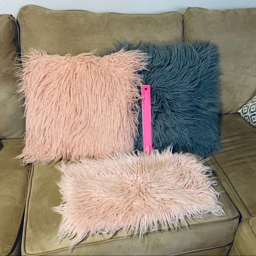Pink and grey fur pillows